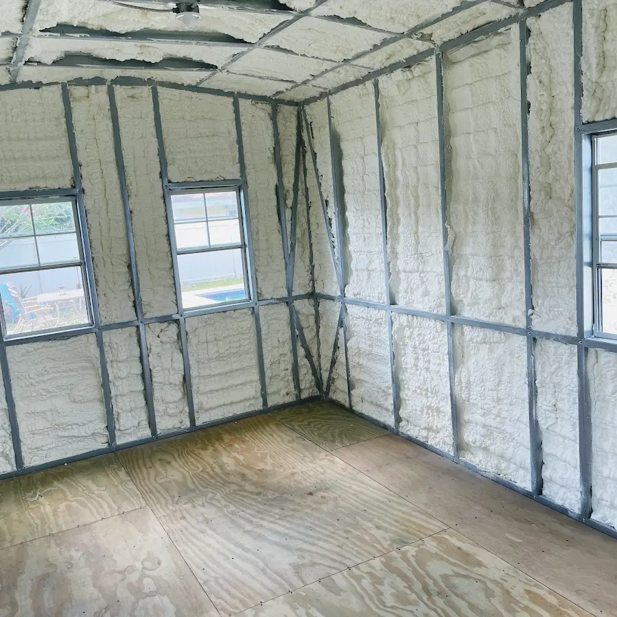 Closed-cell spray foam insulation applied to wall cavities in a residential project in Evans